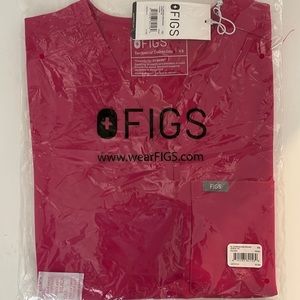 Brand new FIGS pink Catarina one pocket scrub top. Never worn. Size XS.